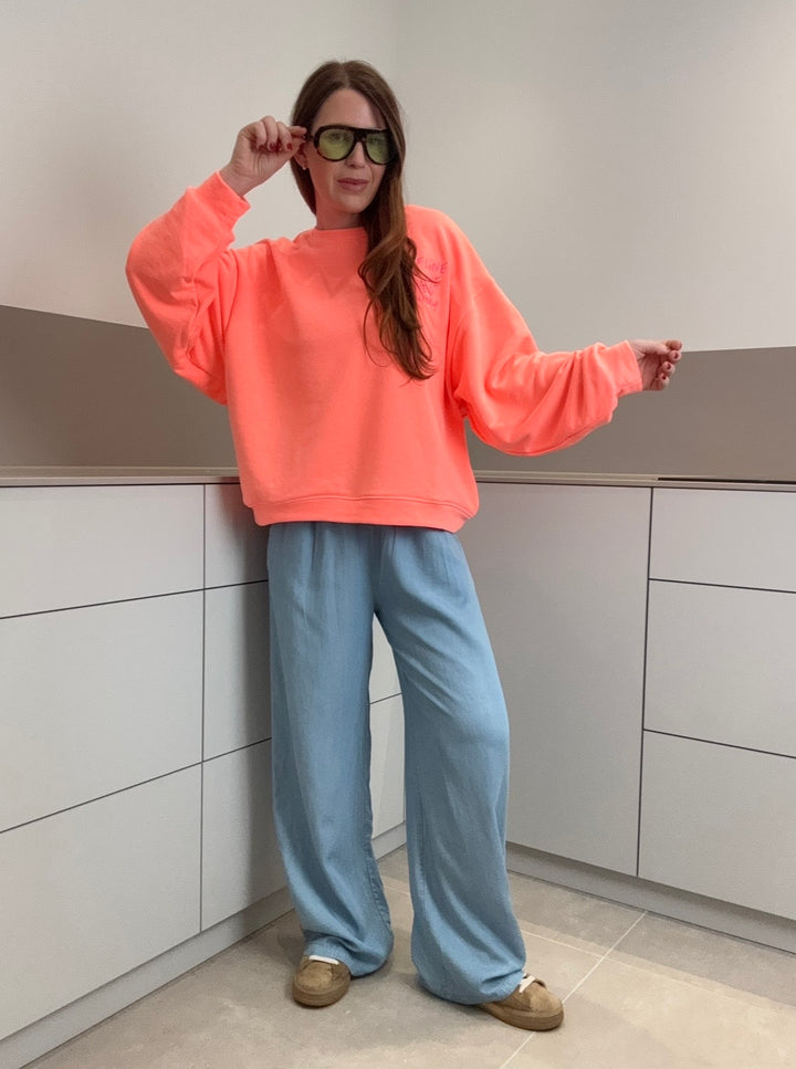 Sweater - Orange mit Aufschrift
